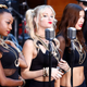 Image for article titled Sycophantic Backup Singers Just Mindlessly Parroting Whatever Lead Singer Says